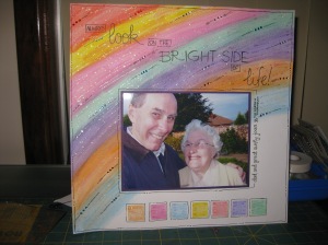 This layout had to use at least 4 colours of the rainbow, a mosaic feature and the phrase 'always look on the bright side of life'